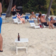 Illustration for article titled Wes Welker Chills On The Beach With His Wife And A Blowup Doll